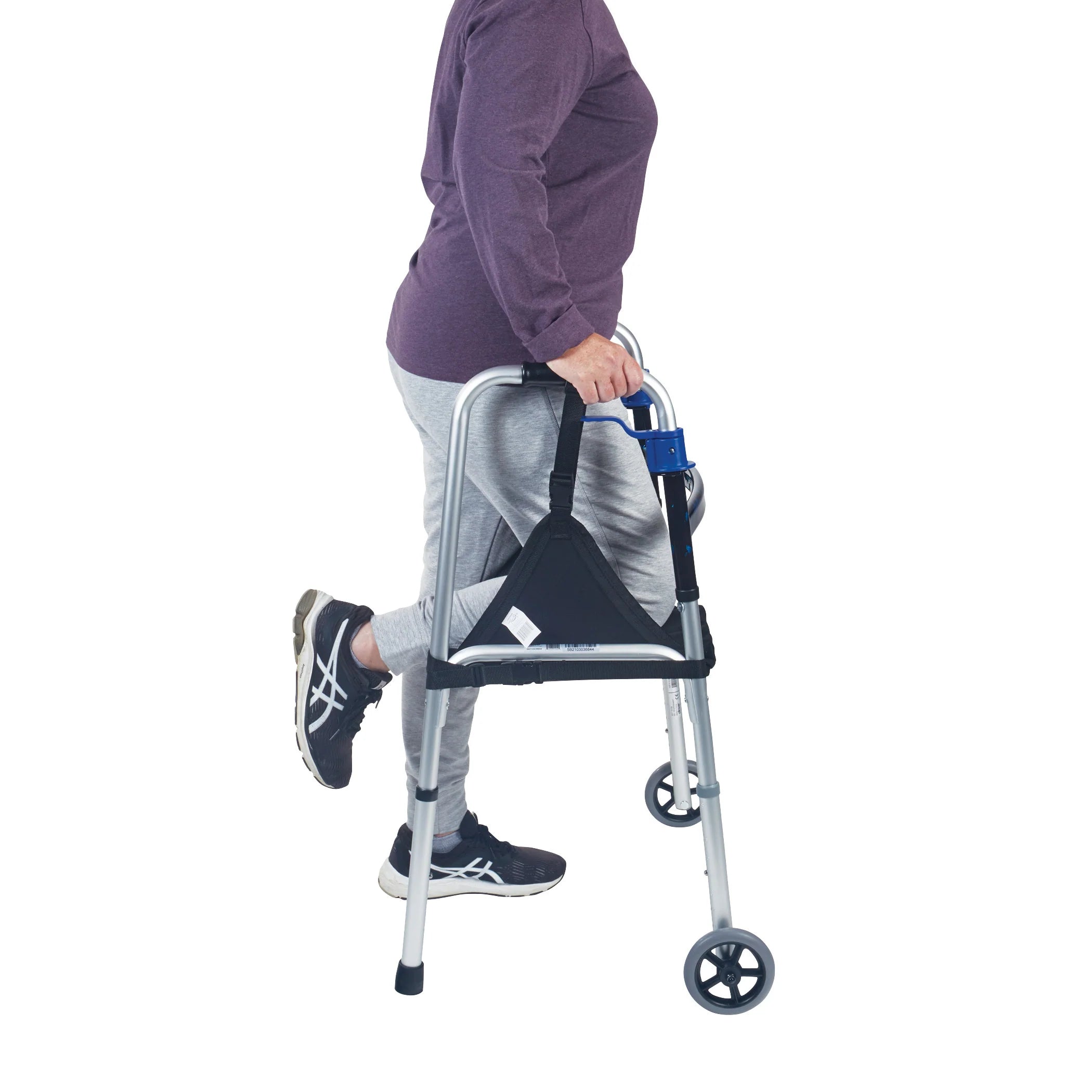 Person using a walker with a bag attached on a white background