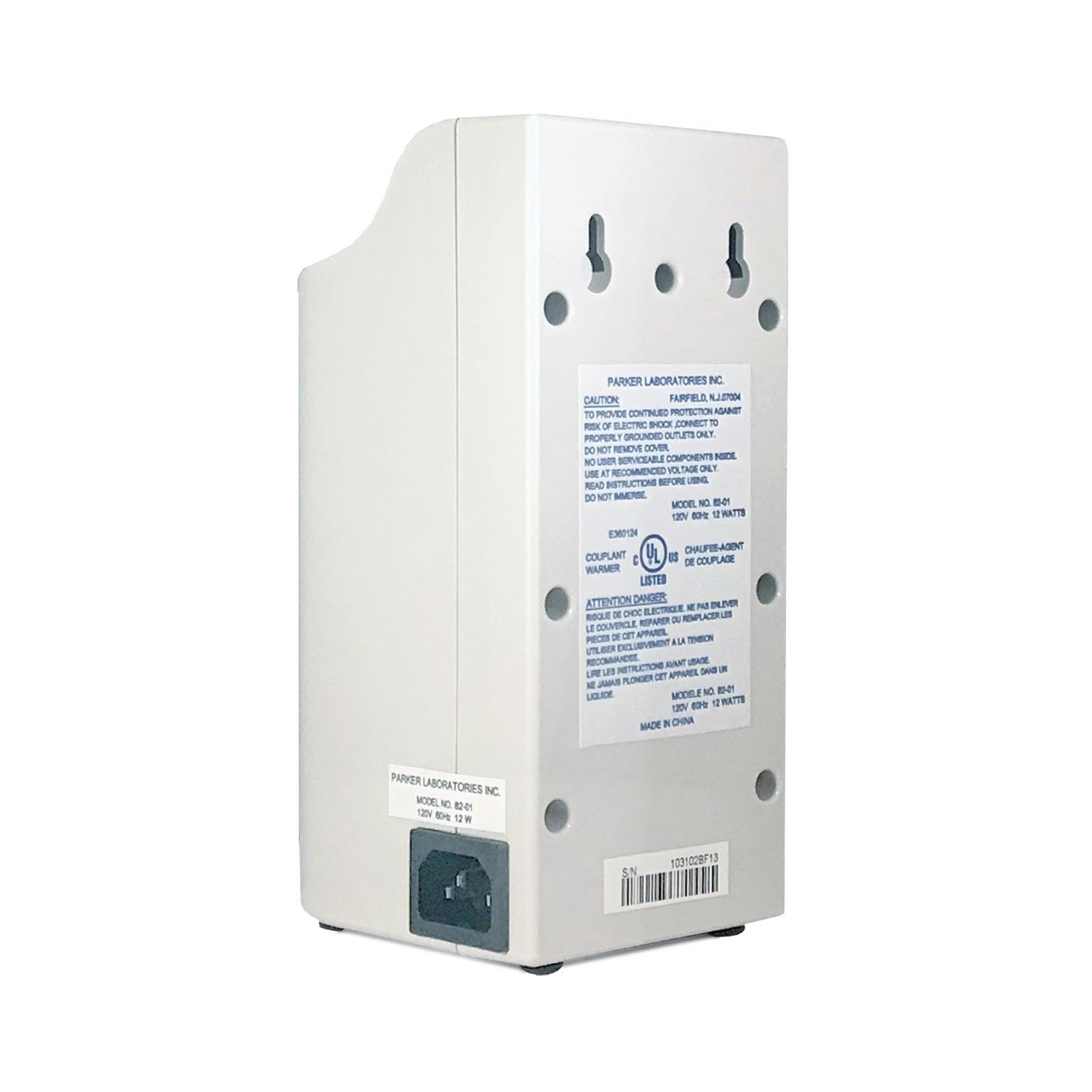 White electronic device with labels and a power socket on a white background