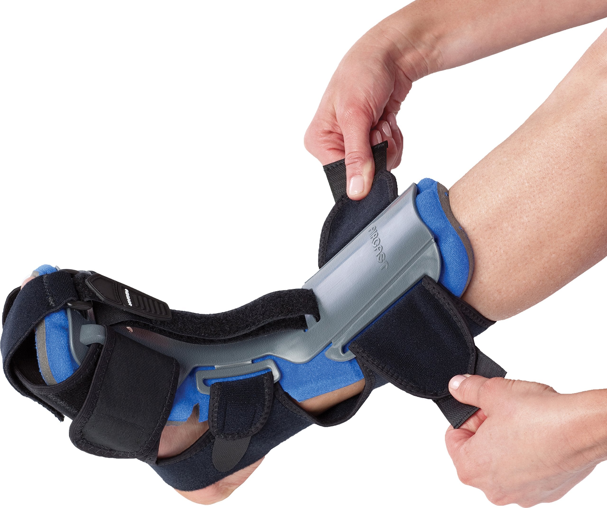Person adjusting a blue and black orthopedic brace on a white background Aircast® AirHeel/DNS Care Kit