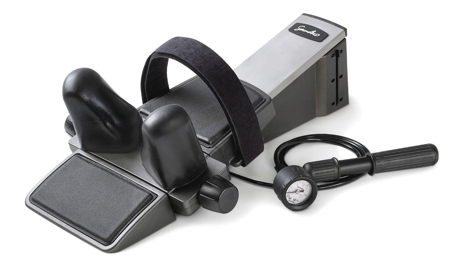 Black and gray electronic device with a foot pedal on a white background