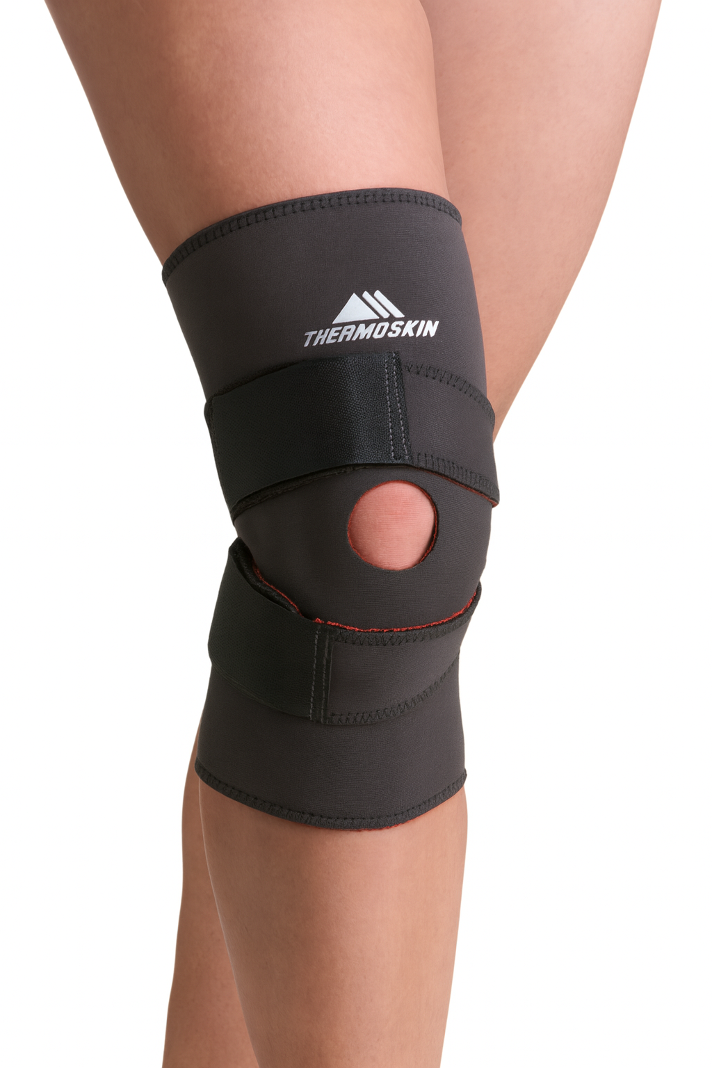 Black knee brace with Thermoskin logo on a white background
