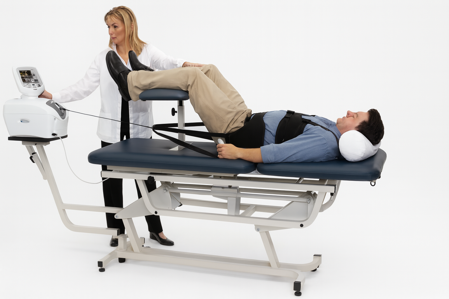 Physiotherapist with patient on a medical examination table