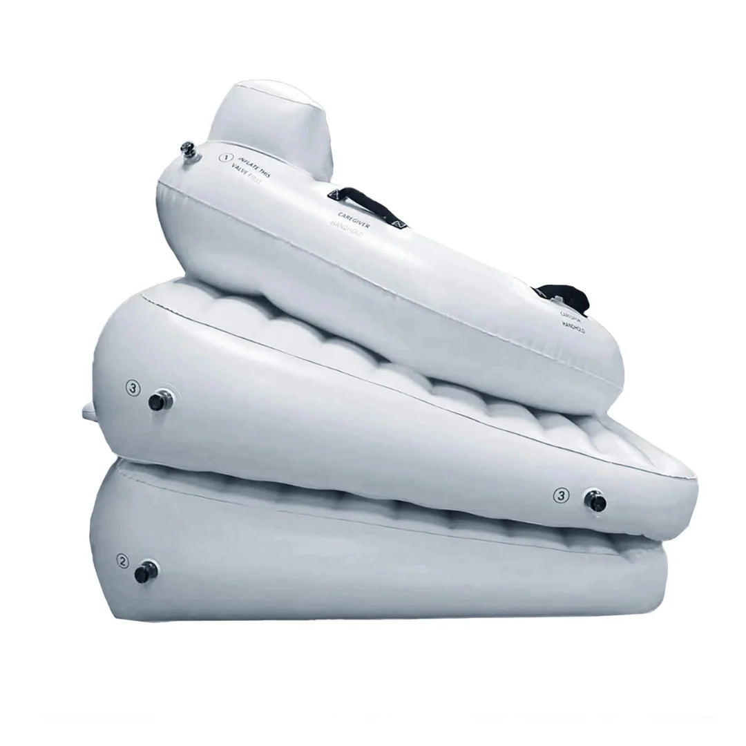 Stack of three inflatable air mattresses on a white background