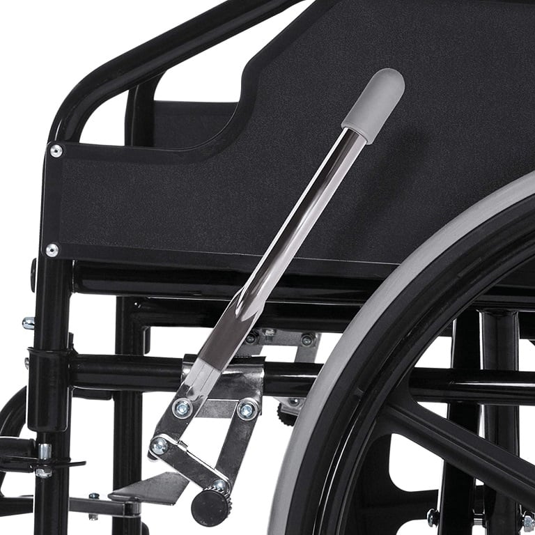 Close-up of a wheelchair with footrest on a white background