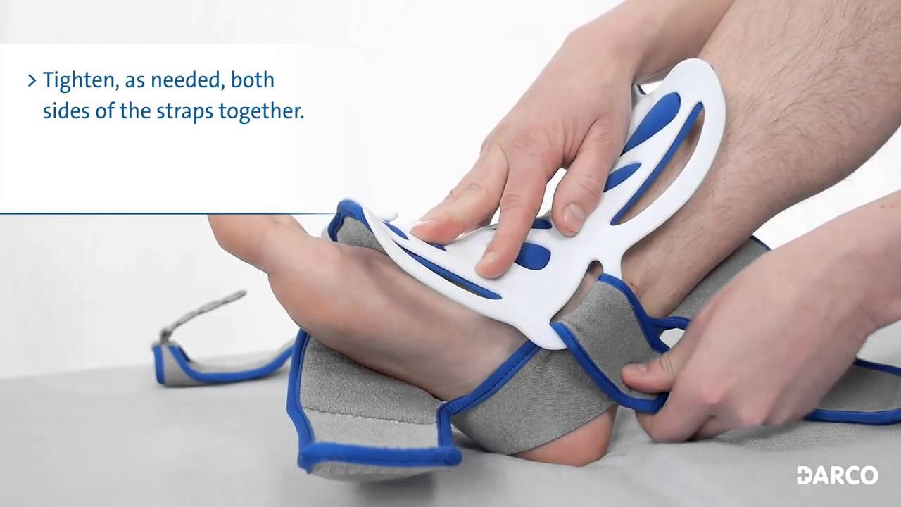 Person using a DARCO foot care device on their foot with text instructions.